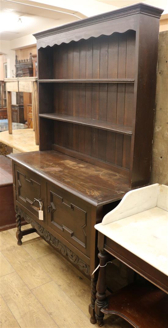 A Jacobean style oak dresser W.121cm